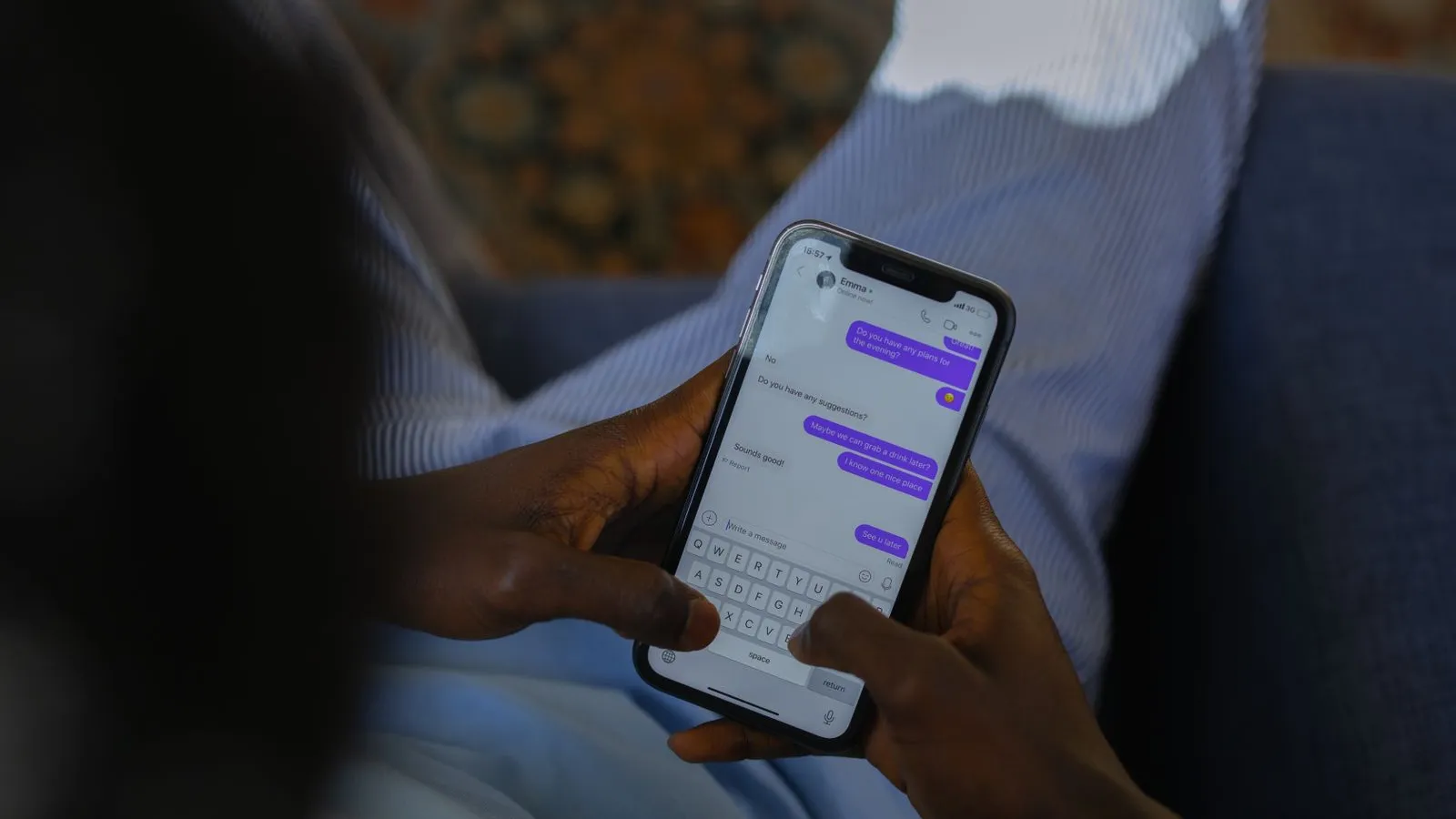 A person types a message to a customer support chat on a smartphone