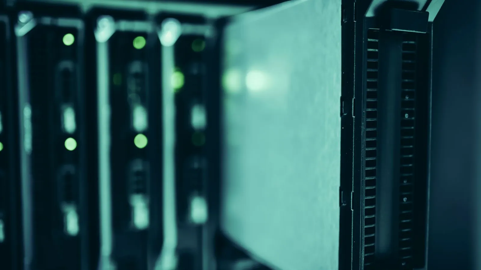 Close-up of server racks with status lights in a data center
